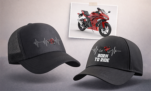 Dos gorras negras con diseño de latido de moto roja, gorra de la derecha con BORN TO RIDE, foto de la moto roja detrás