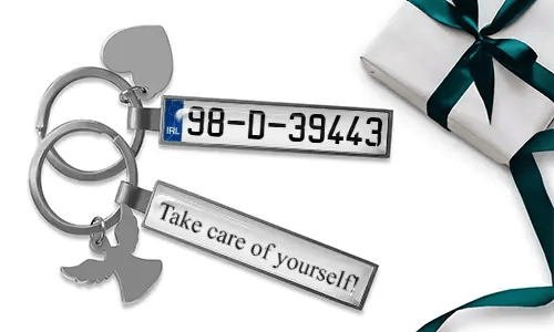 Personalized license plate keychains with custom numbers and metal finish design