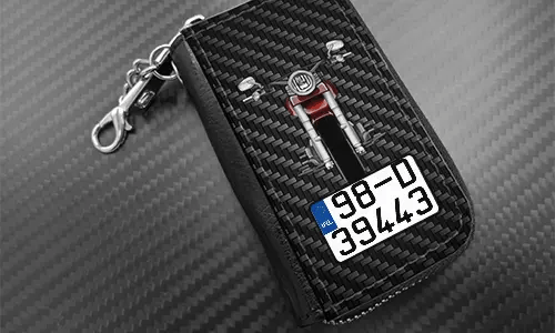 autoschlüssel cover mit Carbon Hintergrund und Motorradsilouette autoschlüssel cover