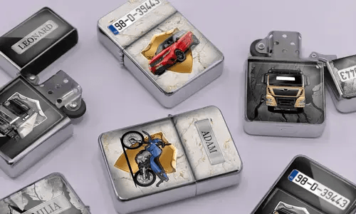 A variety of metal lighters lie on a soft purple surface, featuring personalized designs of cars, motorcycles, and trucks, each marked with different names.