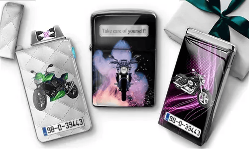 Three motorcycle-themed lighters: green bike on white quilted background, black with 