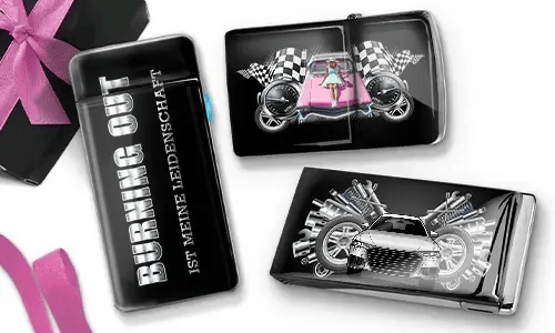 A decorative lighter and two cases featuring racing themes. One lighter reads 