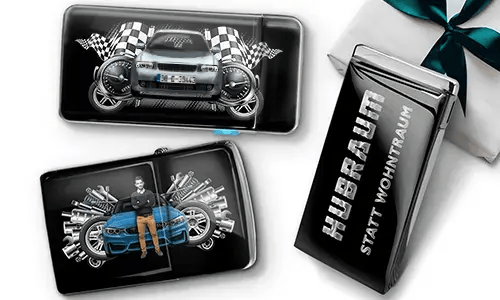 Gift set featuring car-themed metal cases with images of a green sports car, checkered flags, and engine motifs. Includes a 