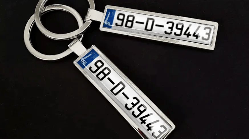 Custom license plate keychains with metal finish and personalized number design